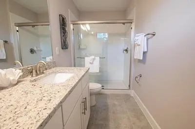 a bathroom with a shower and a sink and a toilet at Relax water view with Hammock near Disney 4736 in Kissimmee