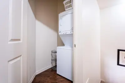 a white refrigerator with its door open in a room at Welcoming 4 BR Sleeps 10 Guests WL2901 in Kissimmee