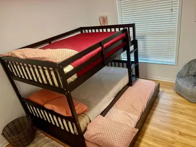 a set of bunk beds in a room at Dreamy Family Pool House in Clermont