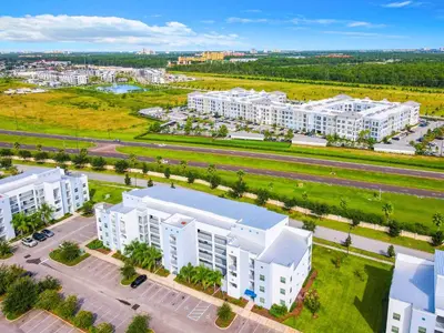 an overhead view of a city with white buildings at Wonderful 2BR Condo with 2 Clubhouses in Kissimmee