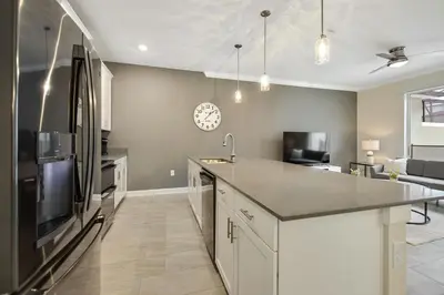 a kitchen with a sink and a counter top at Magic Lily - Storey Lake by Shine Villas #834 townhouse in Kissimmee