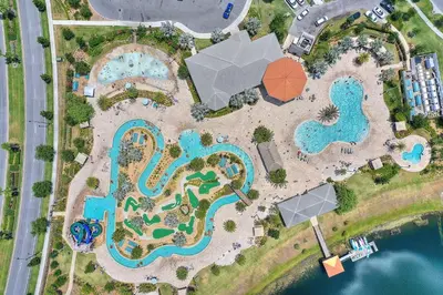 an overhead view of a pool at a resort at Magic Lily - Storey Lake by Shine Villas #834 townhouse in Kissimmee