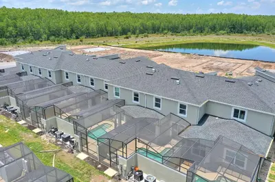 an overhead view of a building with a roof at Magic Lily - Storey Lake by Shine Villas #834 townhouse in Kissimmee