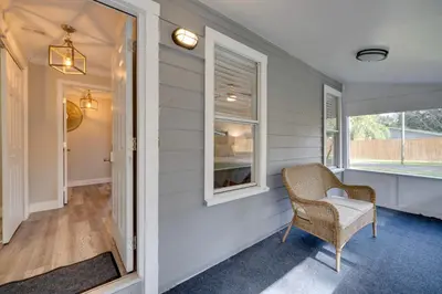 a home office with a chair and a window at Apopka Home with Yard and Grill Near Wekiwa Springs! in Apopka