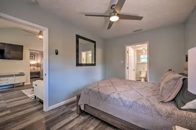 a bedroom with a bed and a ceiling fan at Apopka Getaway with Yard and Covered Patio in Apopka
