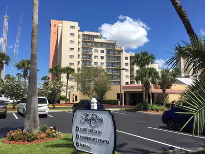 a sign on the side of a street with a building at 3407 Luxury option for your visit in Orlando