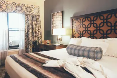 a bedroom with a large bed and a window at Amazing Private Villa @ Orang Lake Resort in Orlando