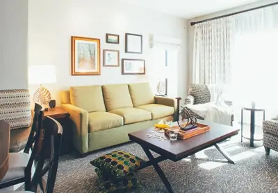a living room with a couch and a coffee table at Amazing Private Villa @ Orang Lake Resort in Orlando