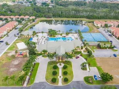 an aerial view of a resort with a pool at Candy Palm townhouse in Kissimmee