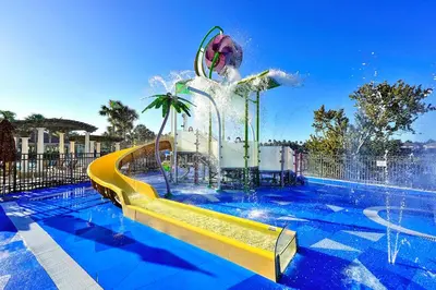 a swimming pool with a water slide at a water park at Windsor Hills Resort Poolside Ground Floor 3 Bed Condo in Orlando