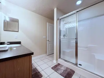 a bathroom with a shower and a sink at Lovely 3-Bedroom Pool Villa-1445SCD villa in Orlando