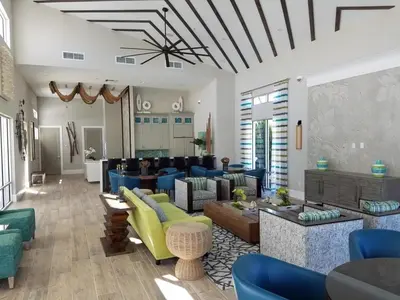 a living room with couches and a dining room at Cozy 4 Bed 3 Bath Pool Hm with Game Room-4450NP home in Kissimmee
