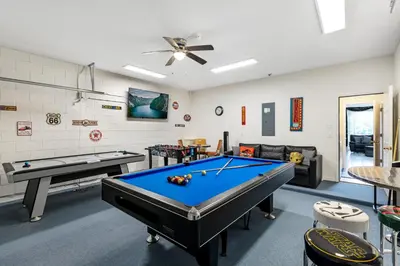a billiard room with a pool table at Family Friendly Emerald Island Resort Vacation Home with Private Pool and Spa Near Disney in Kissimmee