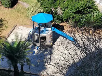 an aerial view of a blue water slide at Remodeled 2BD/2BA Condo mins from Universal Studio in Orlando