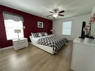 a bedroom with a bed and a ceiling fan at Paradise Palms Resort - 6 Bed 5 Baths Villa in Kissimmee