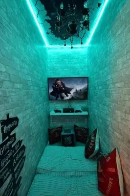 a room with a bed with a blue light at Callaghan Cantina home in Orlando