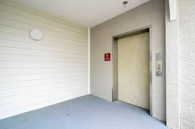 an empty room with a door in a building at Your Orlando home 15 min to Disney - KGG01 in Kissimmee