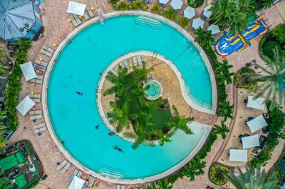 an overhead view of a swimming pool at a resort at Pet friendly in Orlando area near Disney and ESPN Center in Orlando
