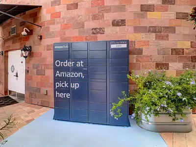 a building with a sign that reads order at an amazon pick up here at Pet friendly in Orlando area near Disney and ESPN Center in Orlando