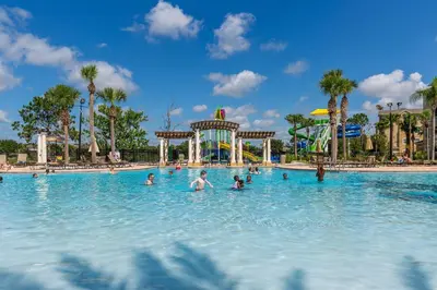 a group of people in a swimming pool at a theme park at One in a Minion #102 in Orlando