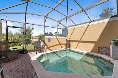 a swimming pool with a tent over it at *PRIVATE POOL* Disney10min - Magical Mickey themed home in Kissimmee