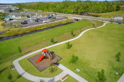 an overhead view of a park with a building in it at Stylish Resort Villa w Pool Near Disney Gated 5BR in Kissimmee