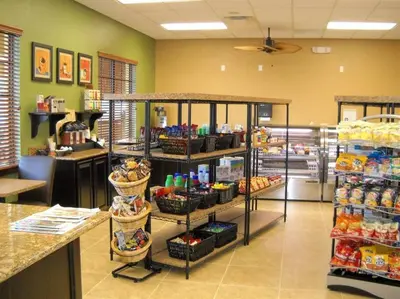 a grocery store with a shelf filled with food at Spacious 4 bed 3 bath Townhome with pool 5 STARS!! in Kissimmee