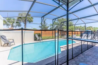 a swimming pool with a metal frame around it at 4552 Bella Vida 2 in Kissimmee
