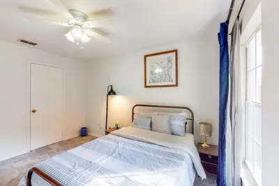 a bedroom with a bed and a ceiling fan at Families with Pets! Home Near Orlando Theme Parks in Orlando