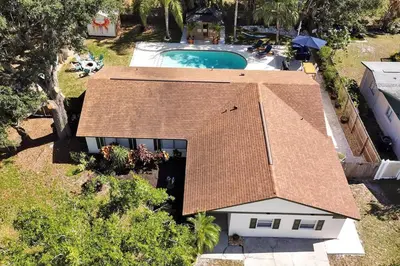 an overhead view of a house with a swimming pool at Private Villa/Outdoor Oasis in Kissimmee