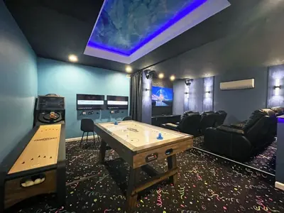 a room with a ping pong table in a room at Under The Sea Villa villa in Orlando