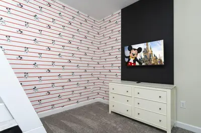 a room with a wall covered in animals on it at Amazing Villa 5BR Heated Pool Themed Rooms - 5 miles Disney in Kissimmee
