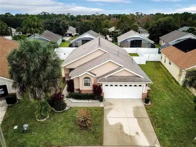 an aerial view of a house with a garage at Magic Orlando Villa, You are in Disney in Kissimmee