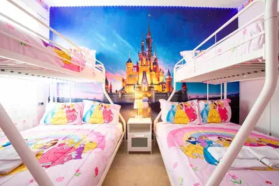 a bedroom with a castle and two bunk beds at Exclusive 8BR Family Villa - Pool, BBQ, Game Room & Themed Bedrooms! in Kissimmee
